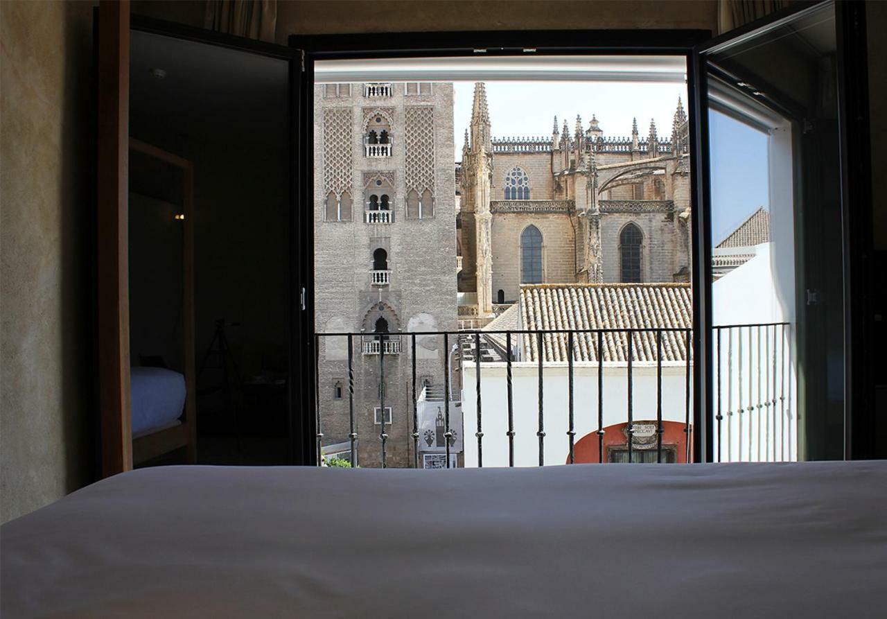 Eme Catedral Mercer Hotel Севилья Экстерьер фото View of the Cathedral of Seville from the hotel